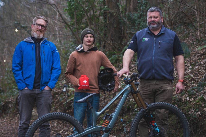 Jacob Cox with Phil Turner (left, Mendip Activity Centre) and Rupert Goolden (right, Really Good First Aid) 